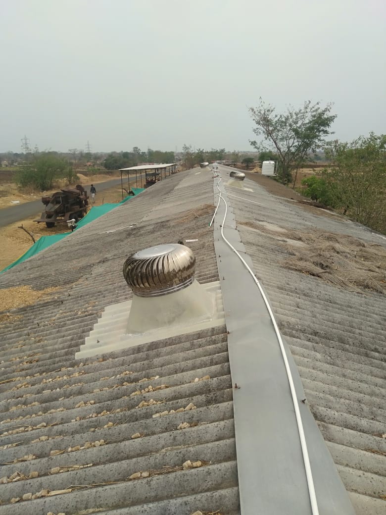 FRP ventilator base plates in installed condition on shed roof.