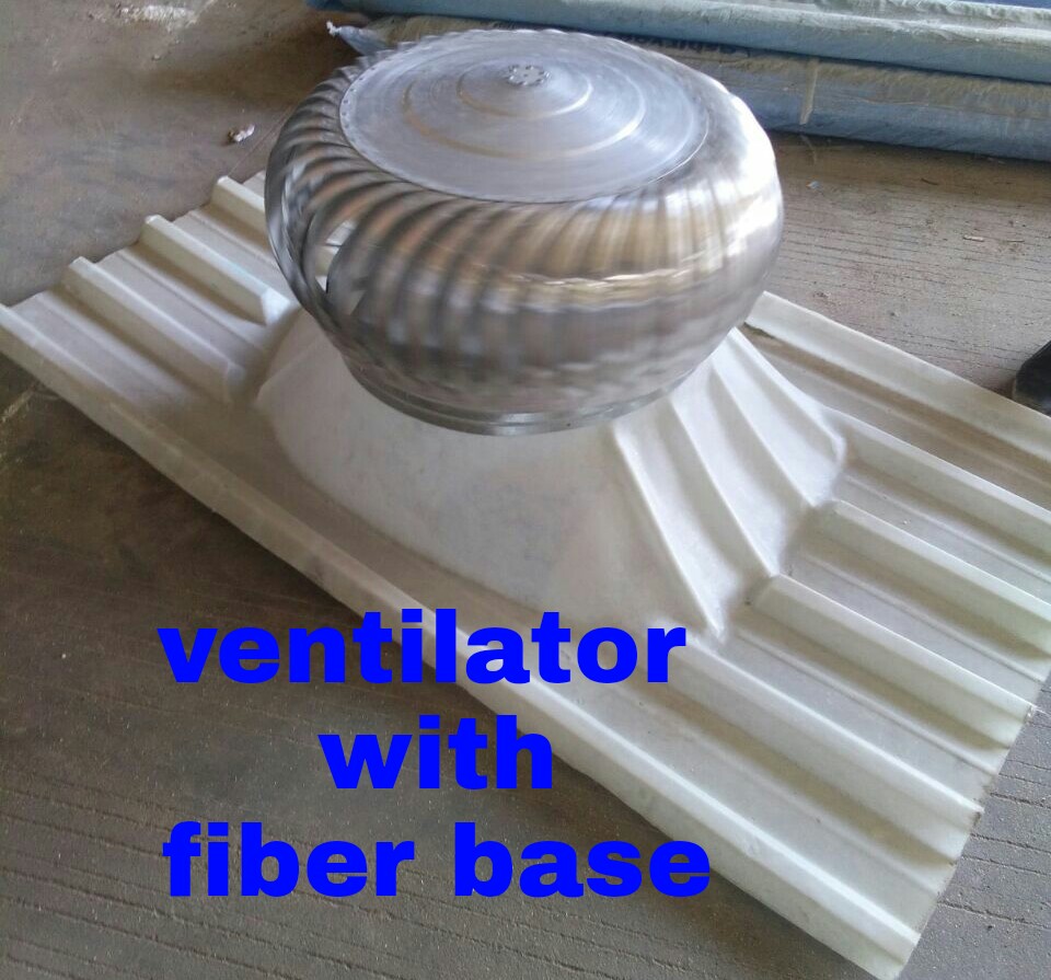 Ventilator with fiber base displayed on floor – silver turbine on white corrugated FRP base.