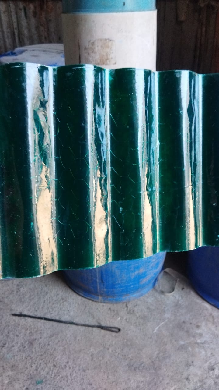 FRP ACC nali/gutter sheet sample showing corrugated profile and glossy finish.