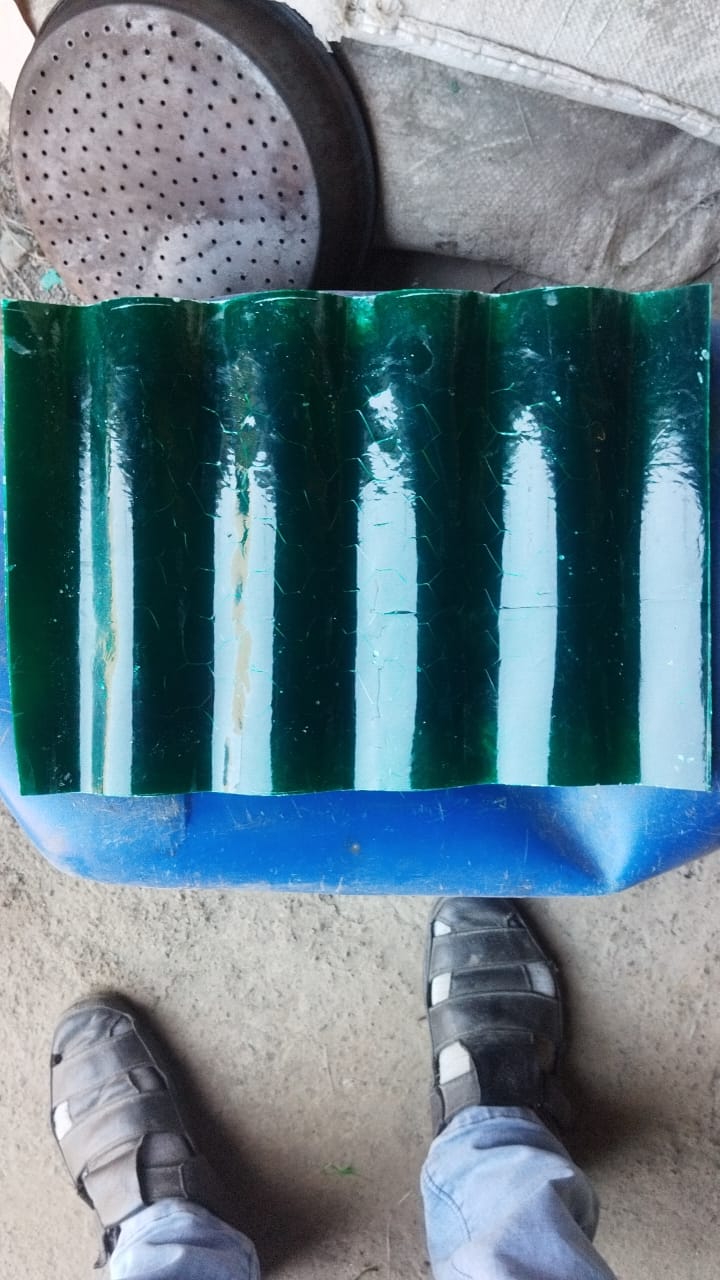 FRP ACC nali/gutter sheet sample (green) showing profile shape and surface finish.