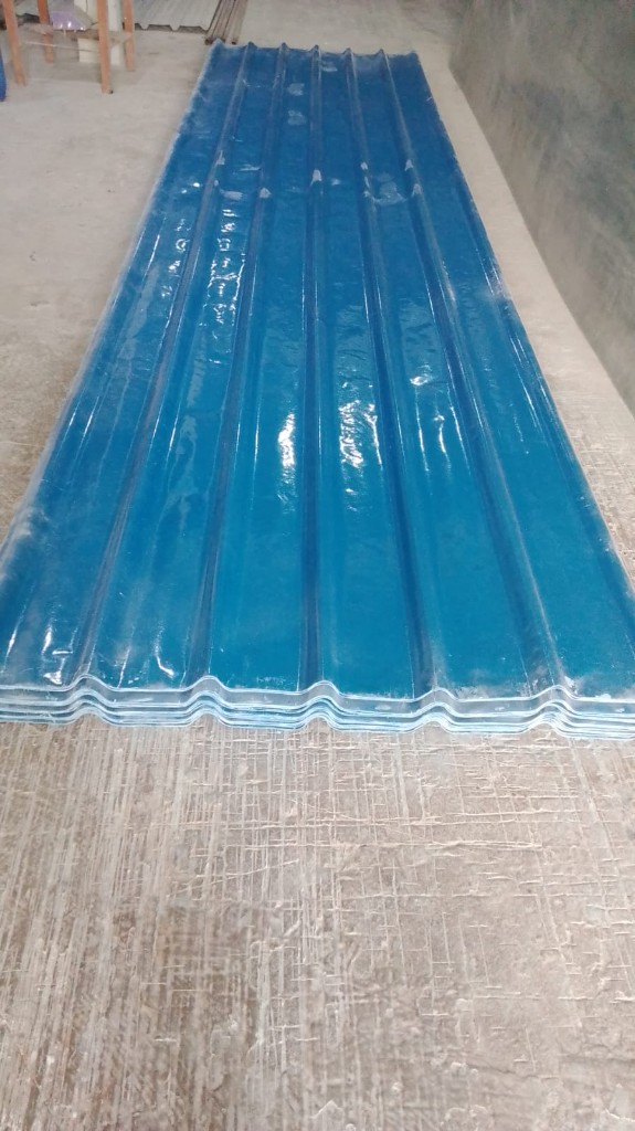 Blue FRP profile sheet panel ready for skylight bands and roofing.